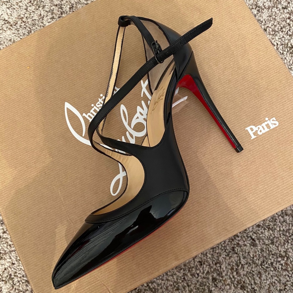 Never worn black Christian Louboutin